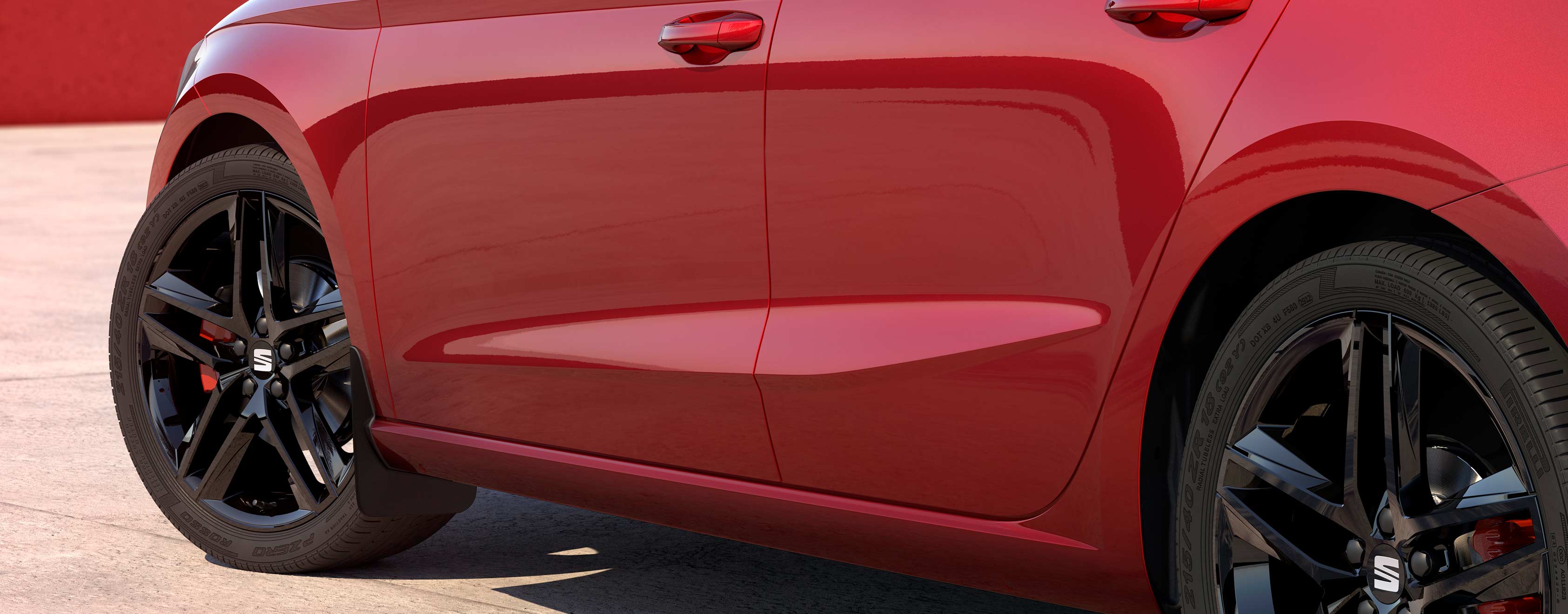 Desire Red -värinen SEAT Ibiza, roiskeläpät edessä ja takana